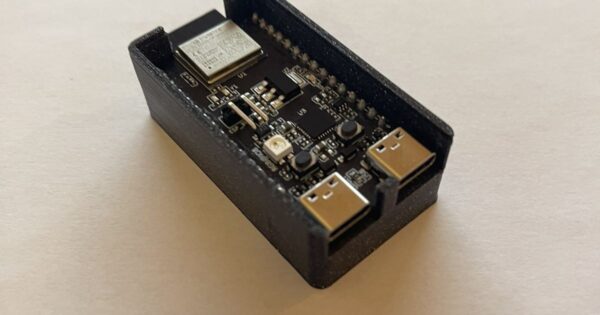 ESP32-C6 DevKitM-1 protective case with board installed and both USB-C ports accessible